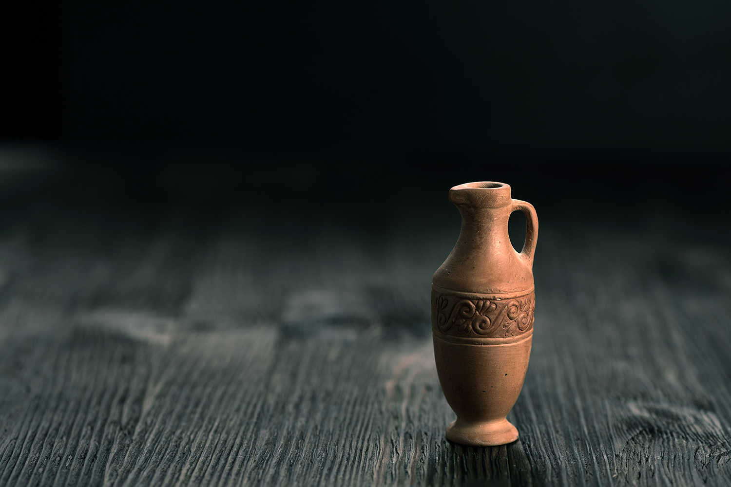 pot on a wooden floor